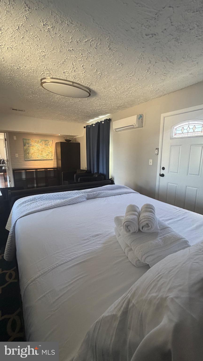 7308 Old Keene Mill Road Springfield, VA 22150 - Photo 18 of 20 a bedroom with a bed and window