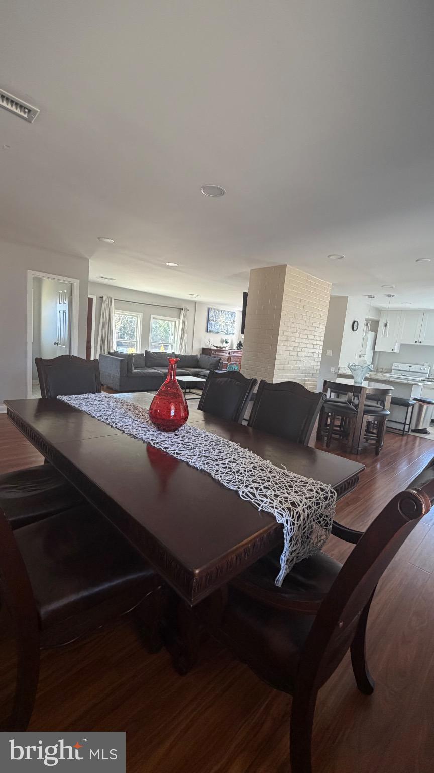 7308 Old Keene Mill Road Springfield, VA 22150 - Photo 20 of 20 a bedroom with a bed and a dresser