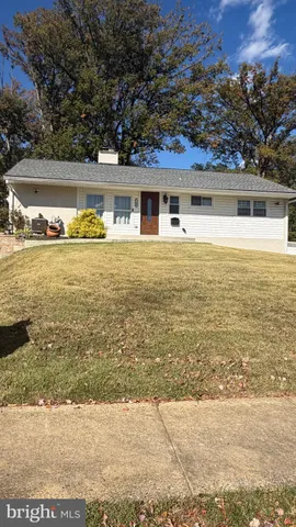 a front view of a house with a ocean view