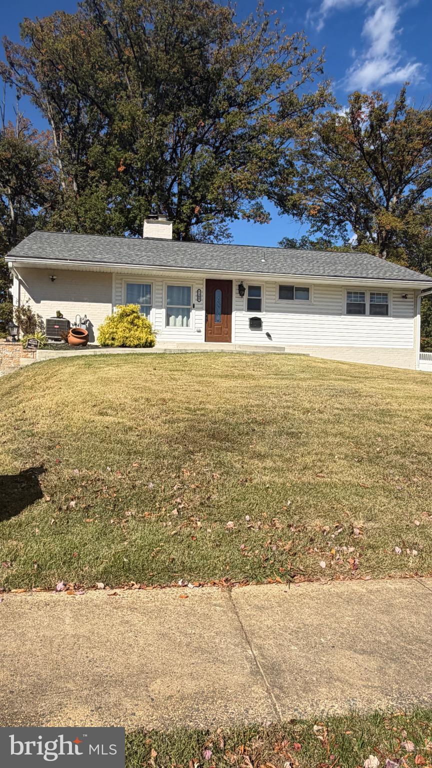 7308 Old Keene Mill Road Springfield, VA 22150 - Photo 3 of 20 a front view of a house with a ocean view