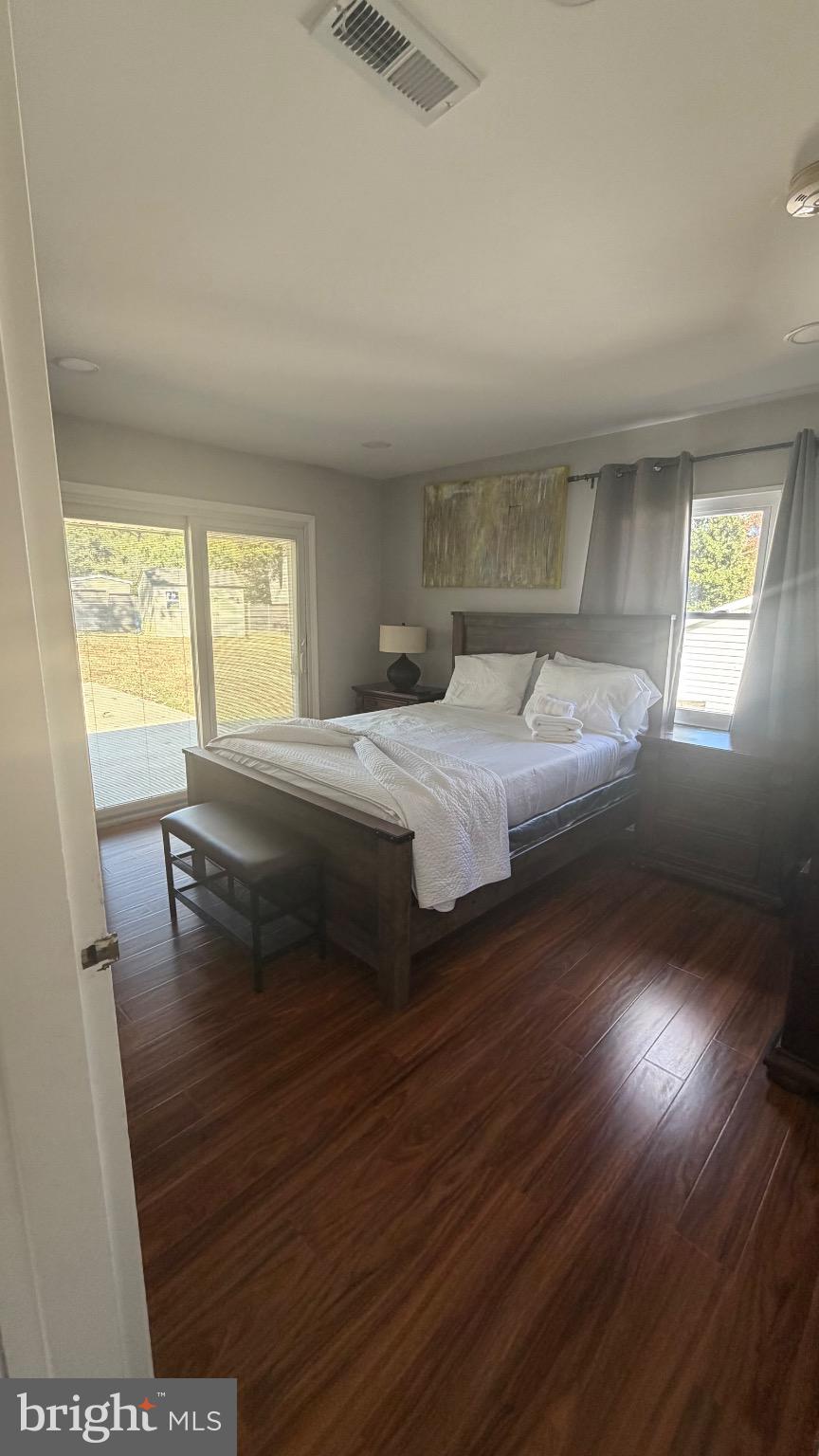 7308 Old Keene Mill Road Springfield, VA 22150 - Photo 10 of 20 a bedroom with a bed and window