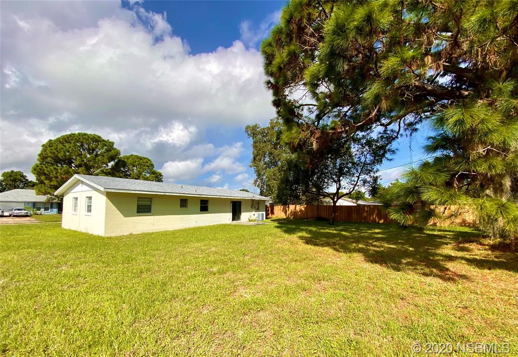 1423 Victory Palm Drive Edgewater, FL 32132 - Photo 3 of 11 a view of a house with a yard