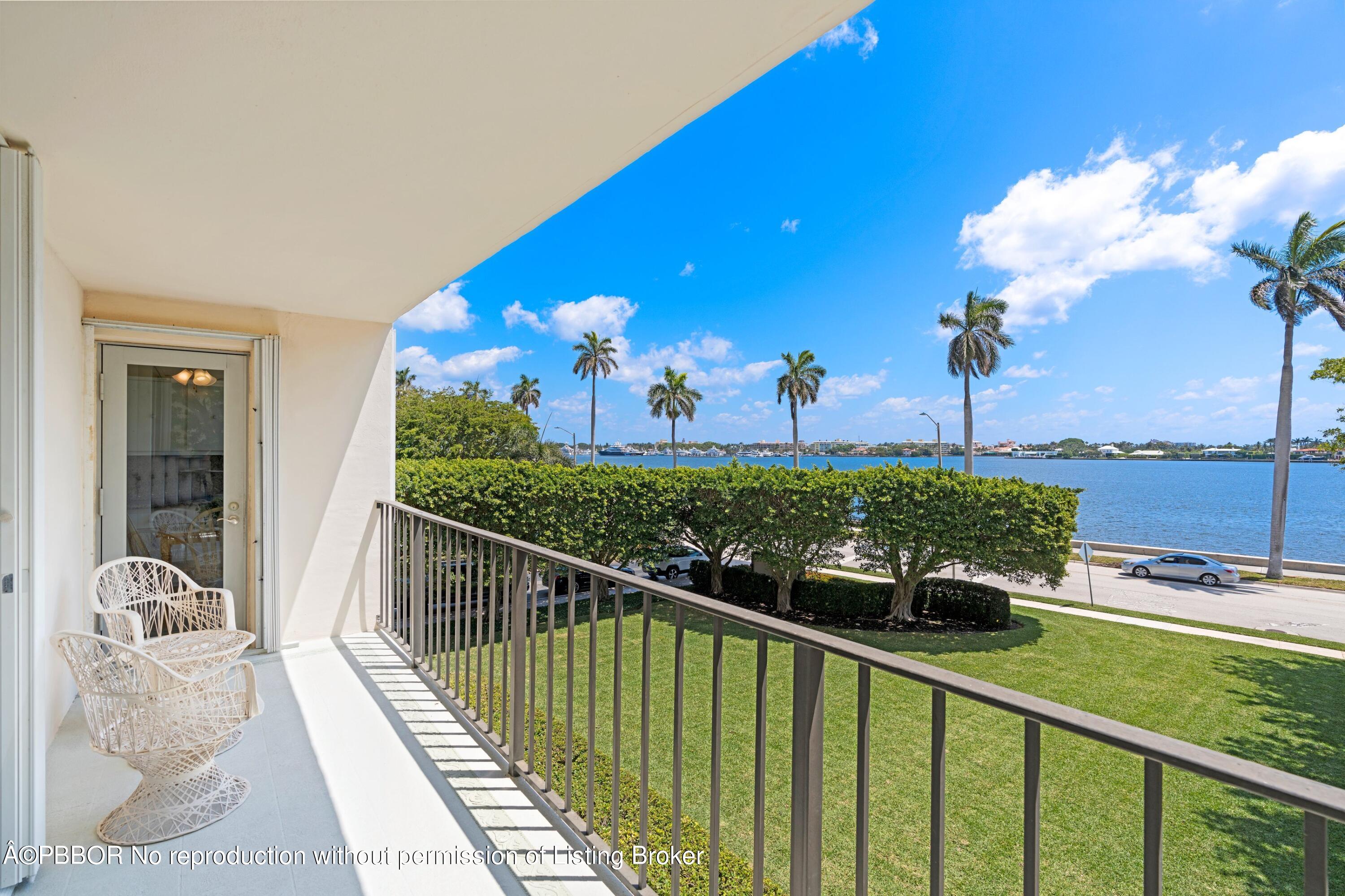 a view of a balcony with dining space