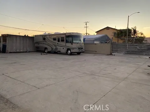 a view of yard with swimming pool and outdoor seating