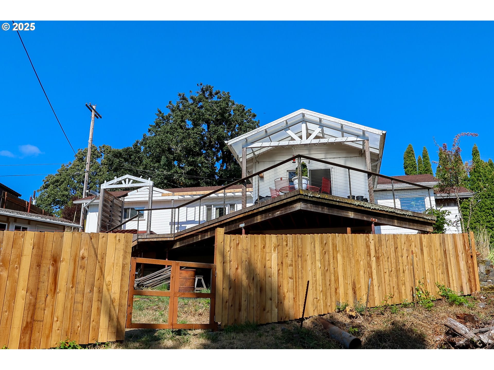 472 Northwest Hot Springs Alameda Road Stevenson, WA 98648 - Photo 11 of 28 a view of a house with a balcony