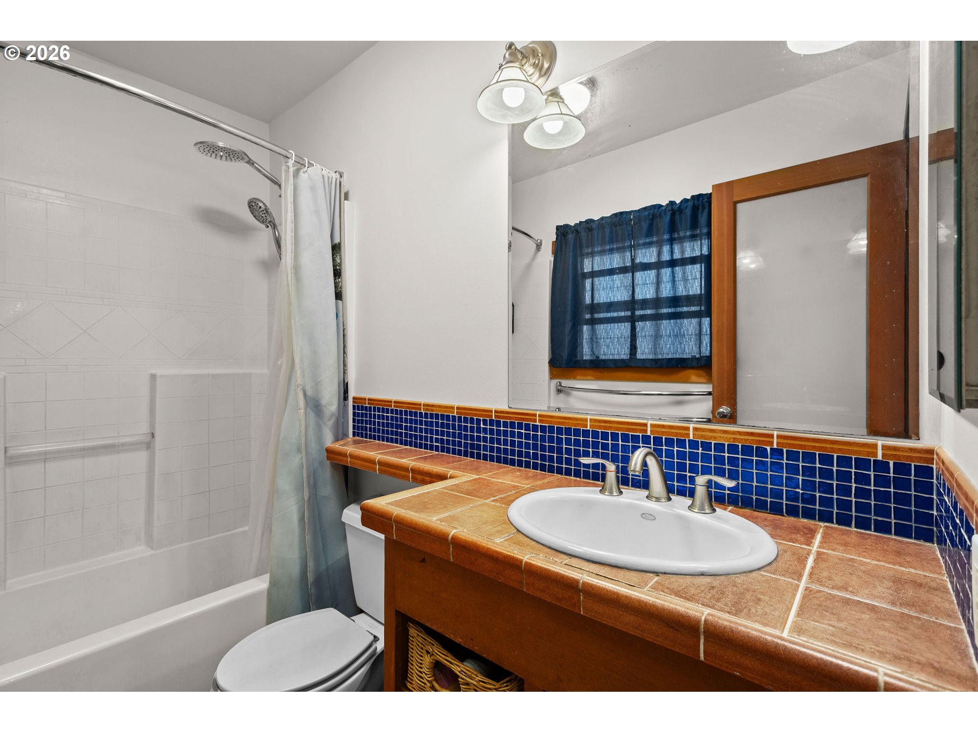 472 Northwest Hot Springs Alameda Road Stevenson, WA 98648 - Photo 41 of 48 a bathroom with a sink a toilet a mirror and shower
