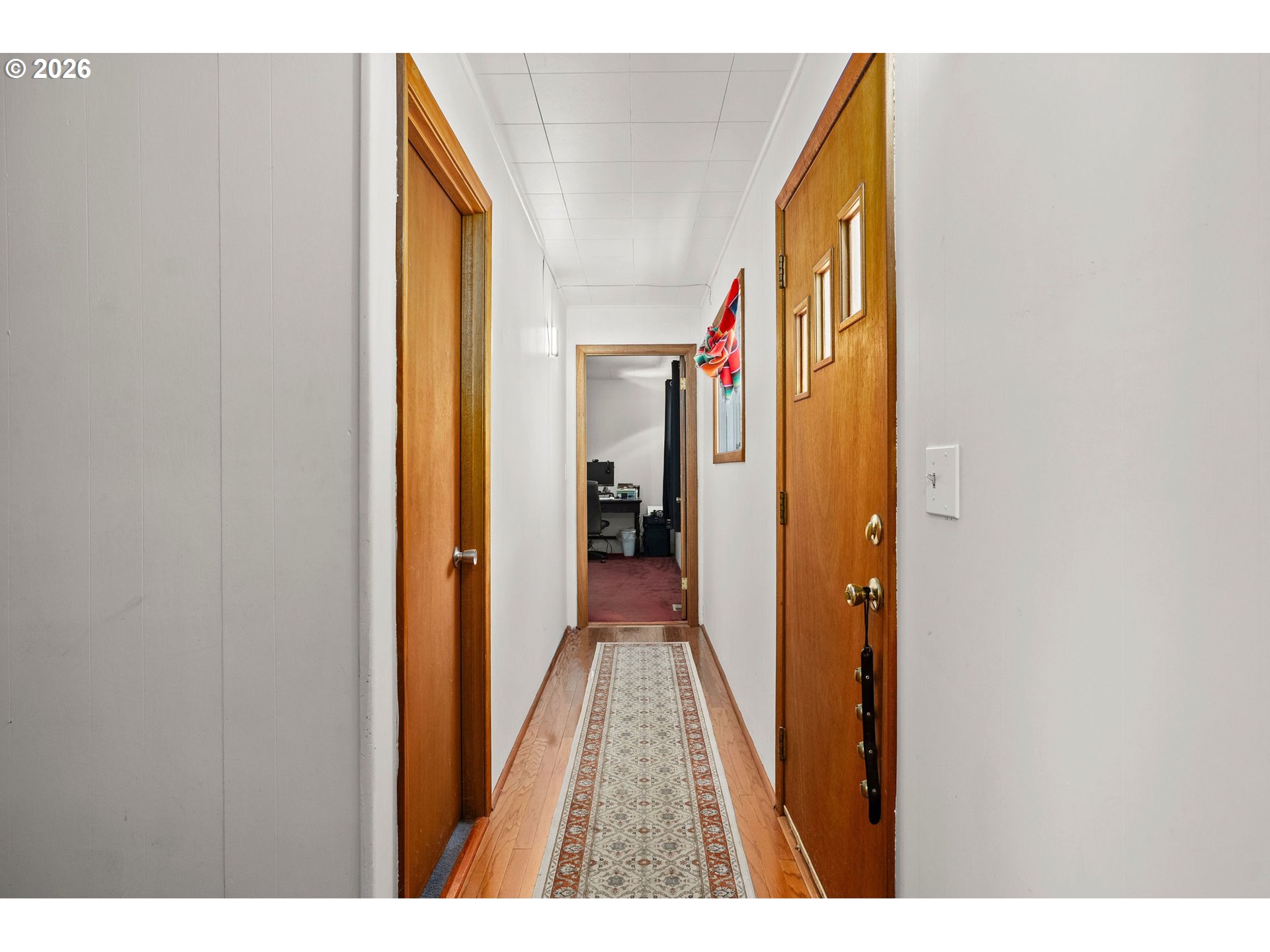 472 Northwest Hot Springs Alameda Road Stevenson, WA 98648 - Photo 43 of 48 a view of a hallway with wooden floor and staircase