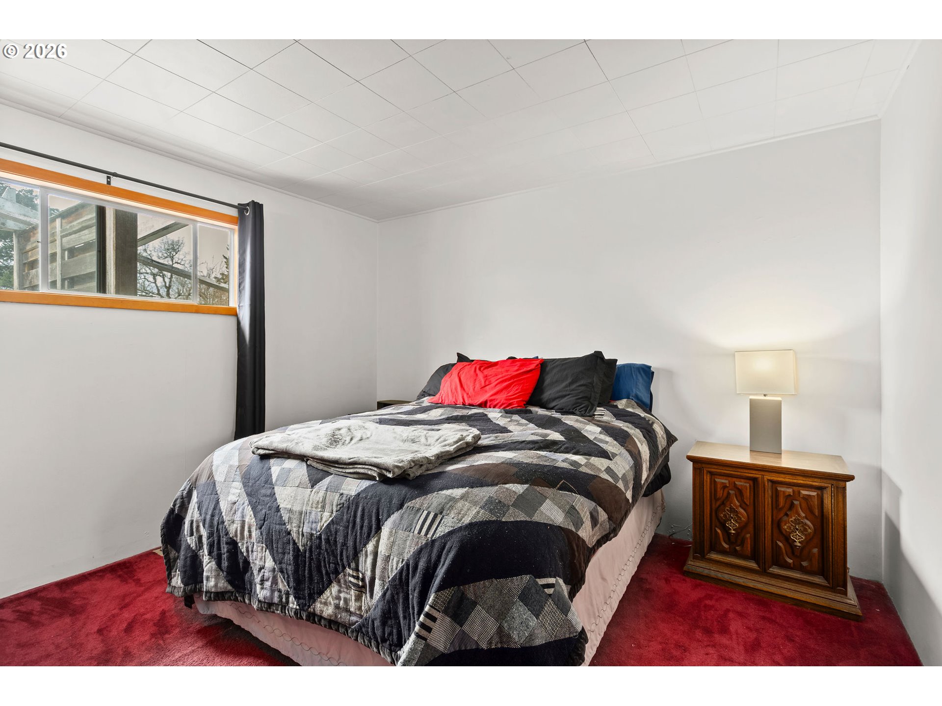 472 Northwest Hot Springs Alameda Road Stevenson, WA 98648 - Photo 46 of 48 a bedroom with a bed with wooden floor