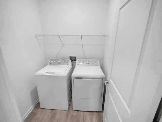a utility room with dryer and washer