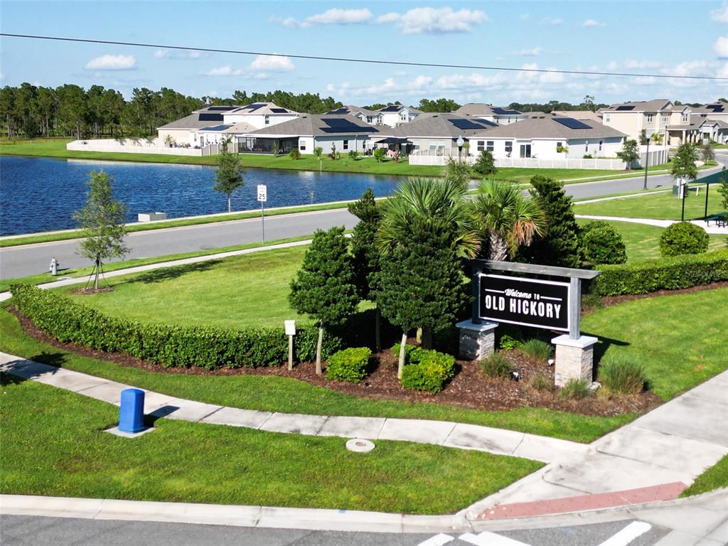 771 Hitch Loop St. Cloud, FL 34772 - Photo 32 of 34 a view of a park with welcome board