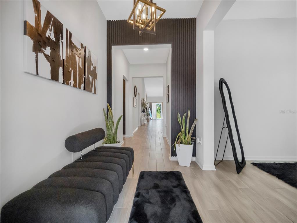 771 Hitch Loop St. Cloud, FL 34772 - Photo 5 of 34 a living room with furniture and a ceiling fan