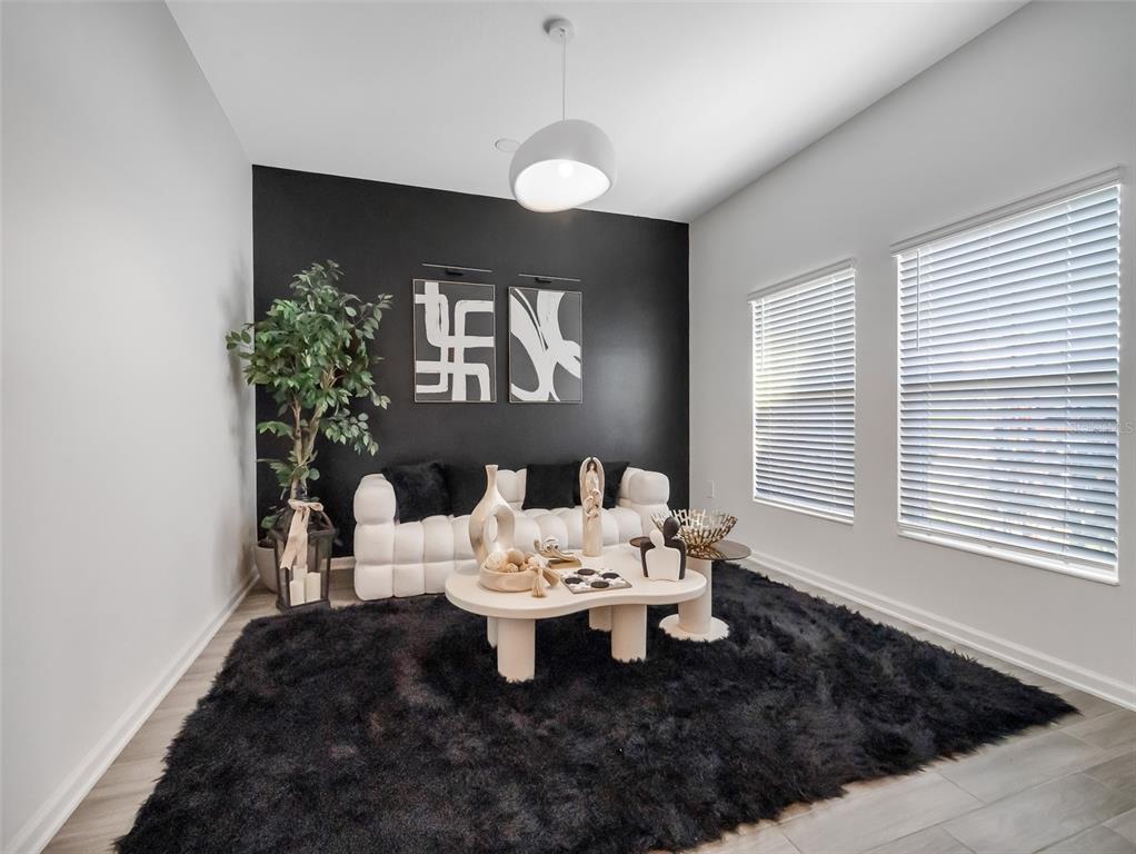 771 Hitch Loop St. Cloud, FL 34772 - Photo 6 of 34 a living room with furniture and window