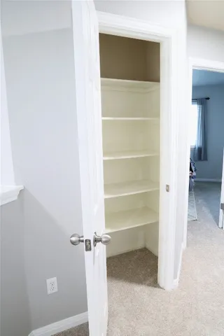 a view of a room with rack on the wall