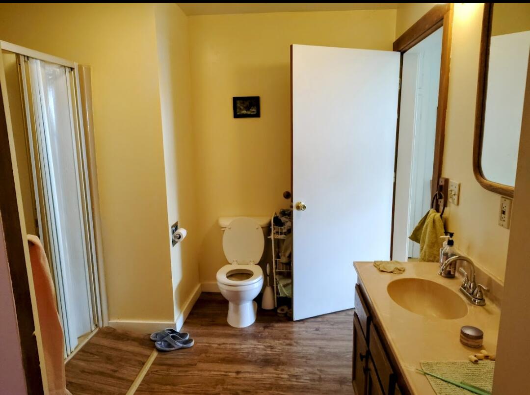 298 Main Street Monument, OR 97864 - Photo 19 of 66 a bathroom with a sink and a mirror