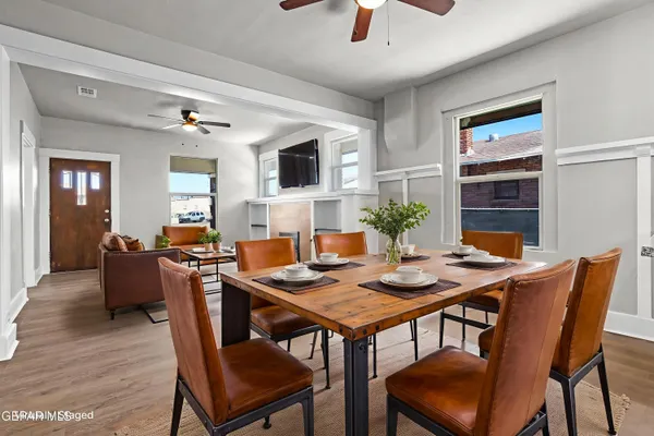 a view of a dining room with furniture