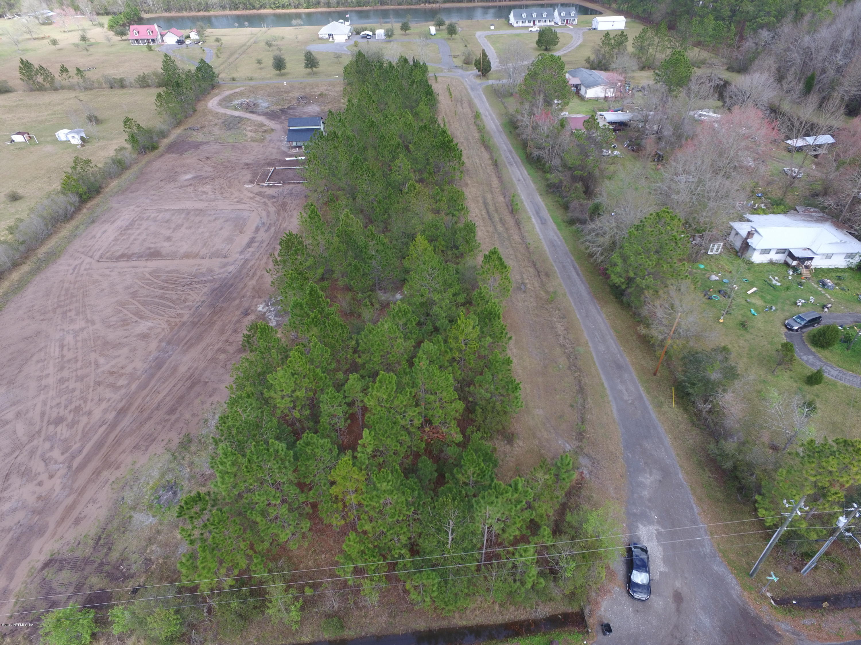 13361 Joandale Road Jacksonville, FL 32220 - Photo 15 of 22 a view of a garden with a flower