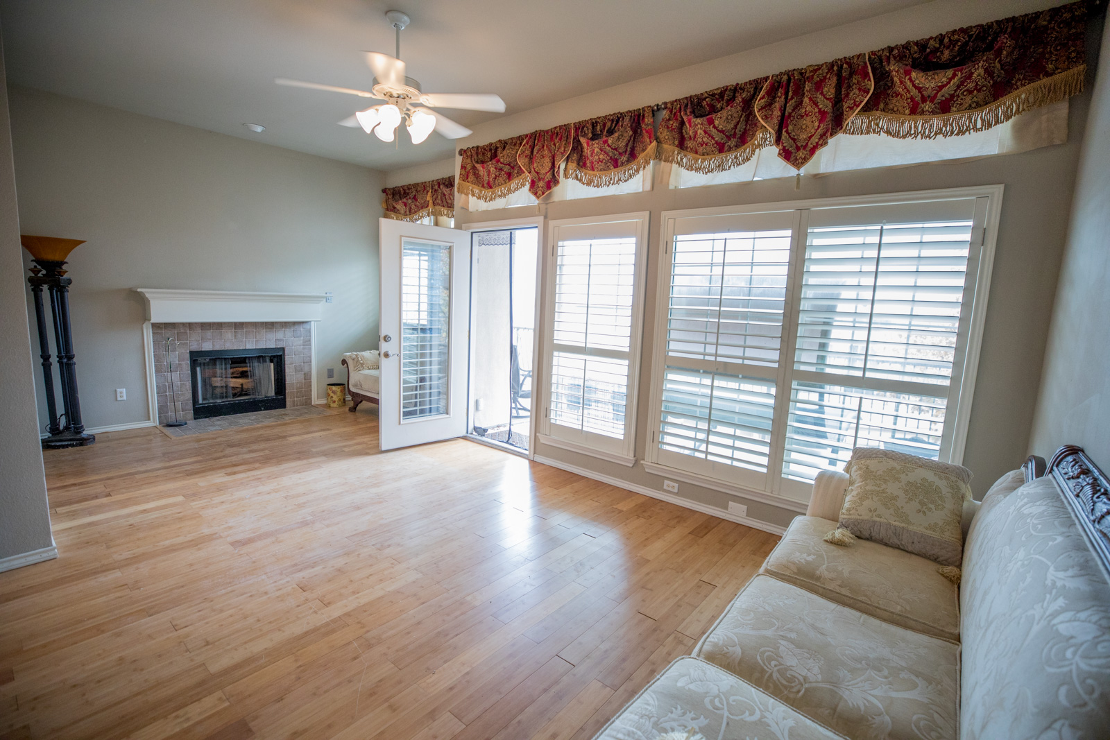2918 Ranch Road 620 North, Unit 270 Austin, TX 78734 - Photo 19 of 34 a living room with furniture and a fireplace