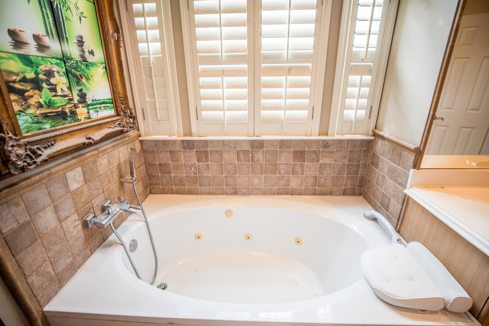 2918 Ranch Road 620 North, Unit 270 Austin, TX 78734 - Photo 25 of 34 a bathroom with a bathtub and a window