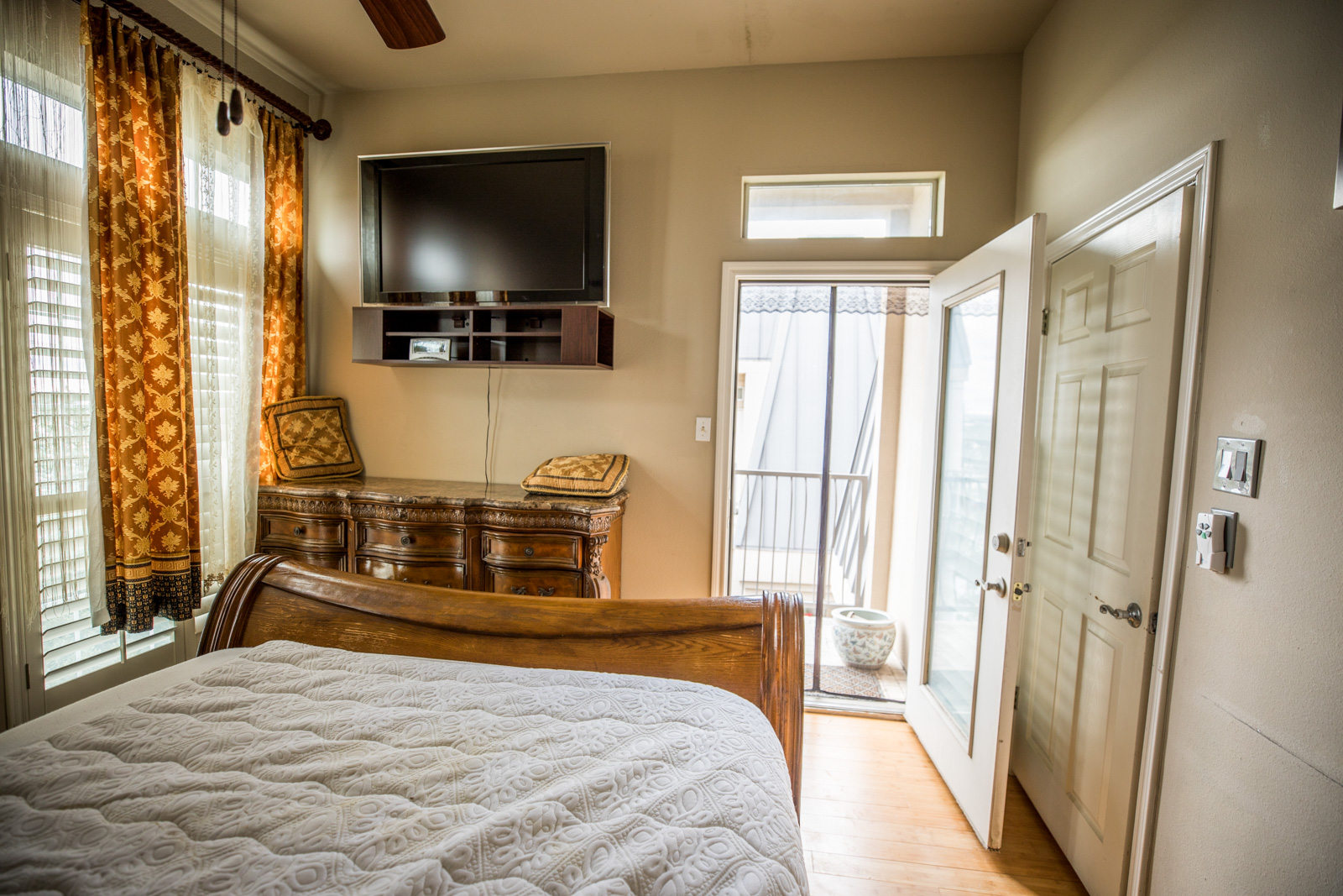 2918 Ranch Road 620 North, Unit 270 Austin, TX 78734 - Photo 29 of 34 a bedroom with a bed and a flat screen tv