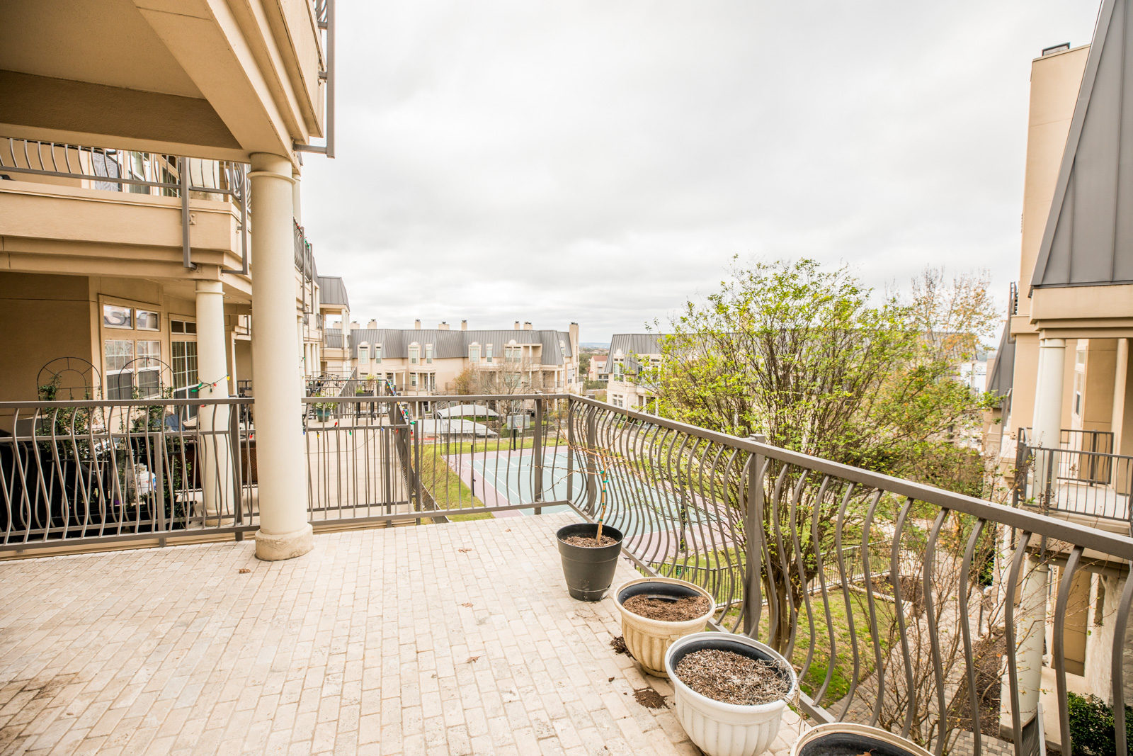 2918 Ranch Road 620 North, Unit 270 Austin, TX 78734 - Photo 3 of 34 a view of a balcony with chairs