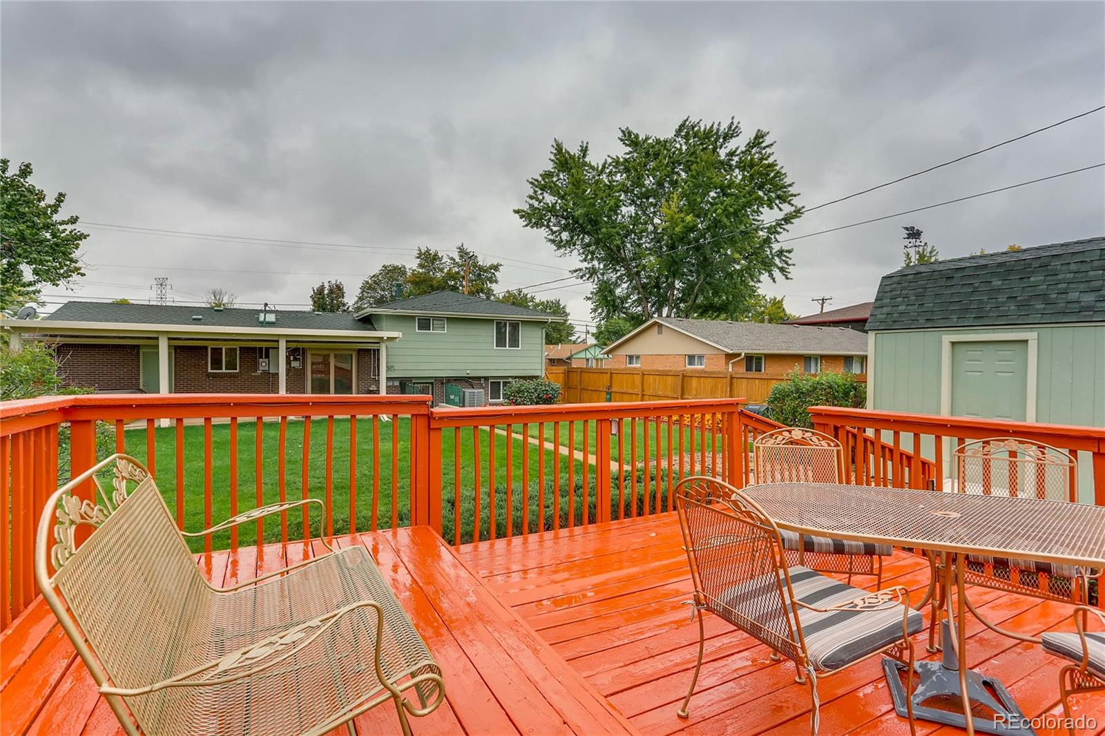 1458 South Oneida Street Denver, CO 80224 - Photo 28 of 33 a view of a house with pool and deck