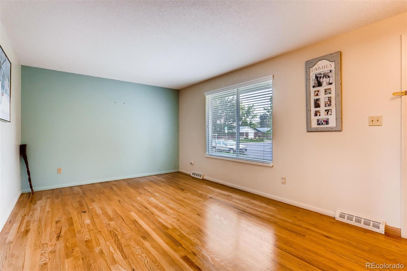 1458 South Oneida Street Denver, CO 80224 - Photo 7 of 33 a view of empty room with window