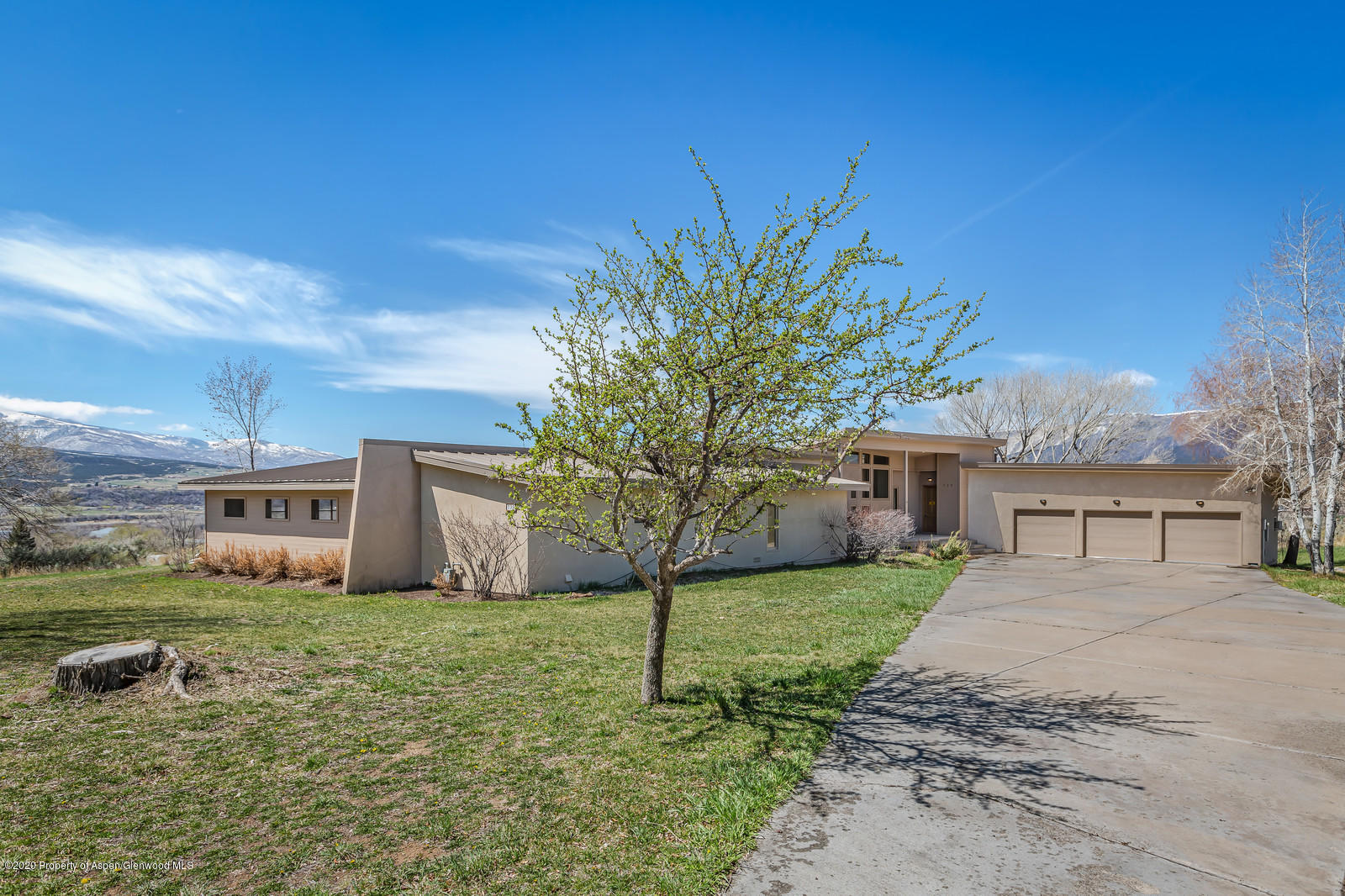 735 Ute Avenue Rifle, CO 81650 - Photo 1 of 30 a house view with a garden space