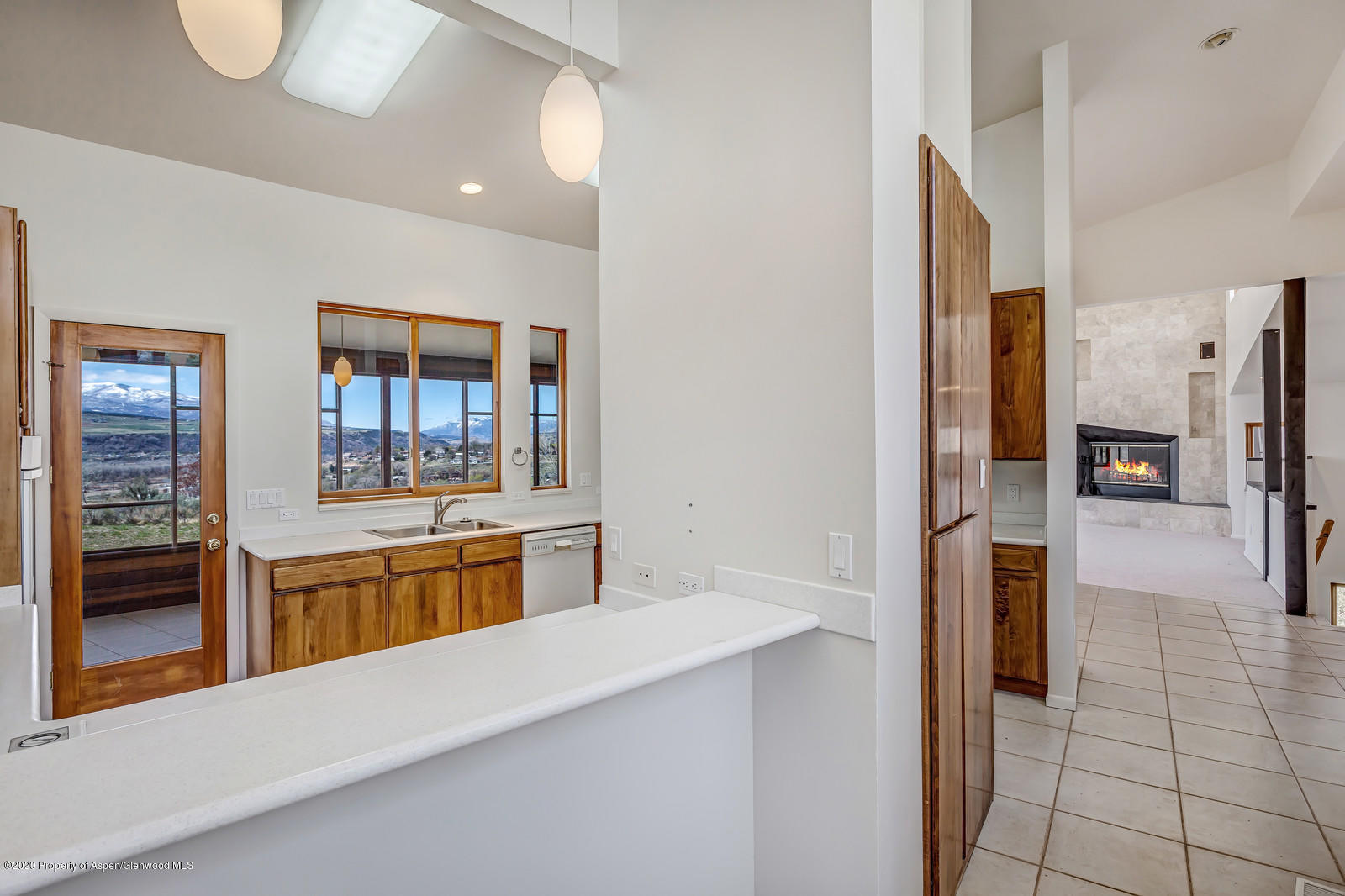735 Ute Avenue Rifle, CO 81650 - Photo 15 of 30 a kitchen with stainless steel appliances a refrigerator and stove