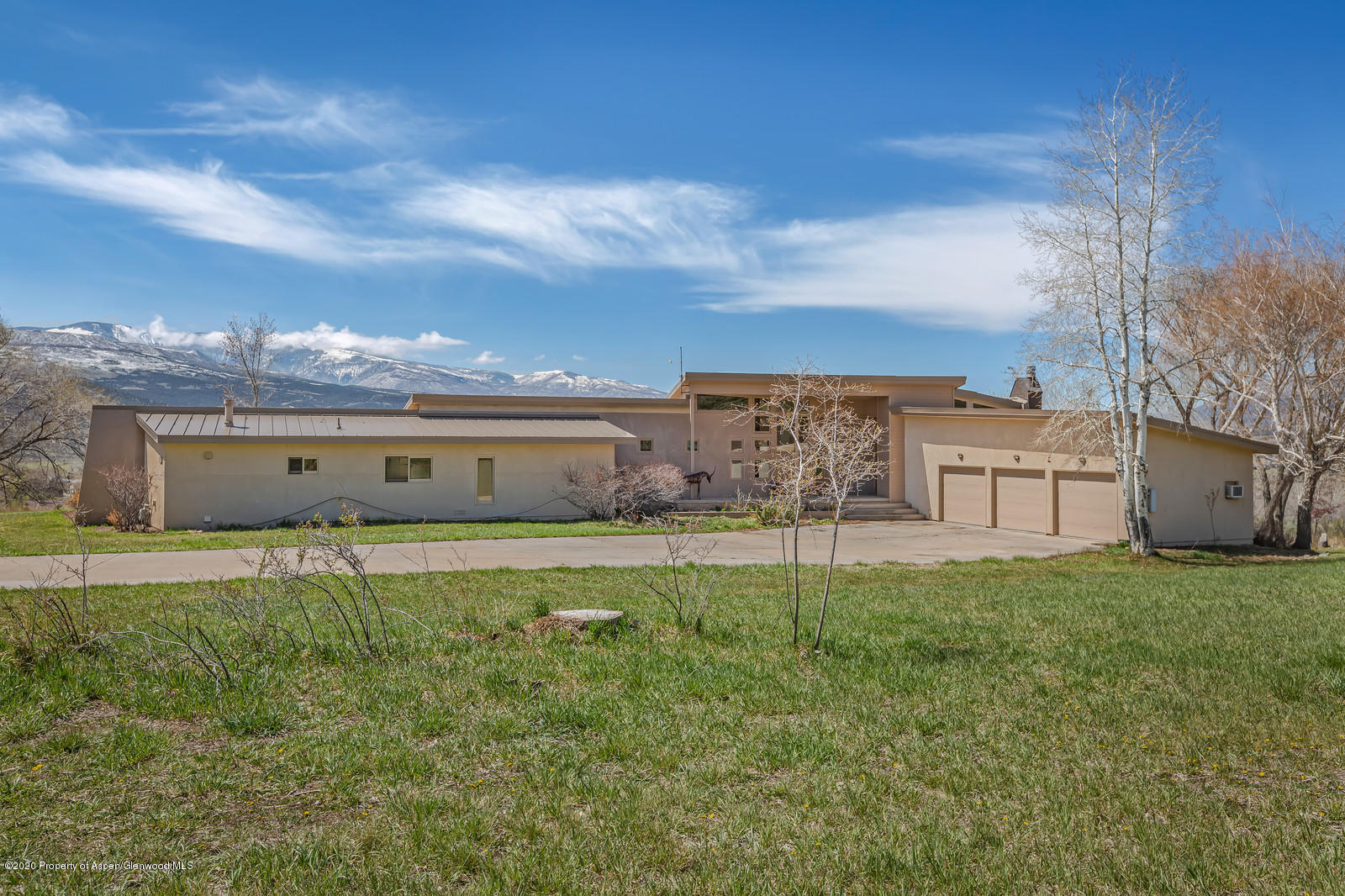 735 Ute Avenue Rifle, CO 81650 - Photo 2 of 30 a house view with a garden space