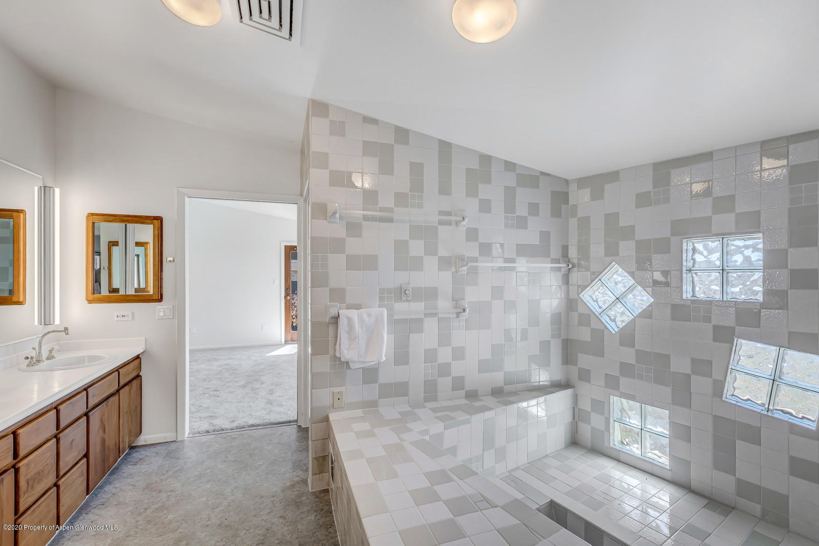 735 Ute Avenue Rifle, CO 81650 - Photo 23 of 30 a spacious bathroom with a shower