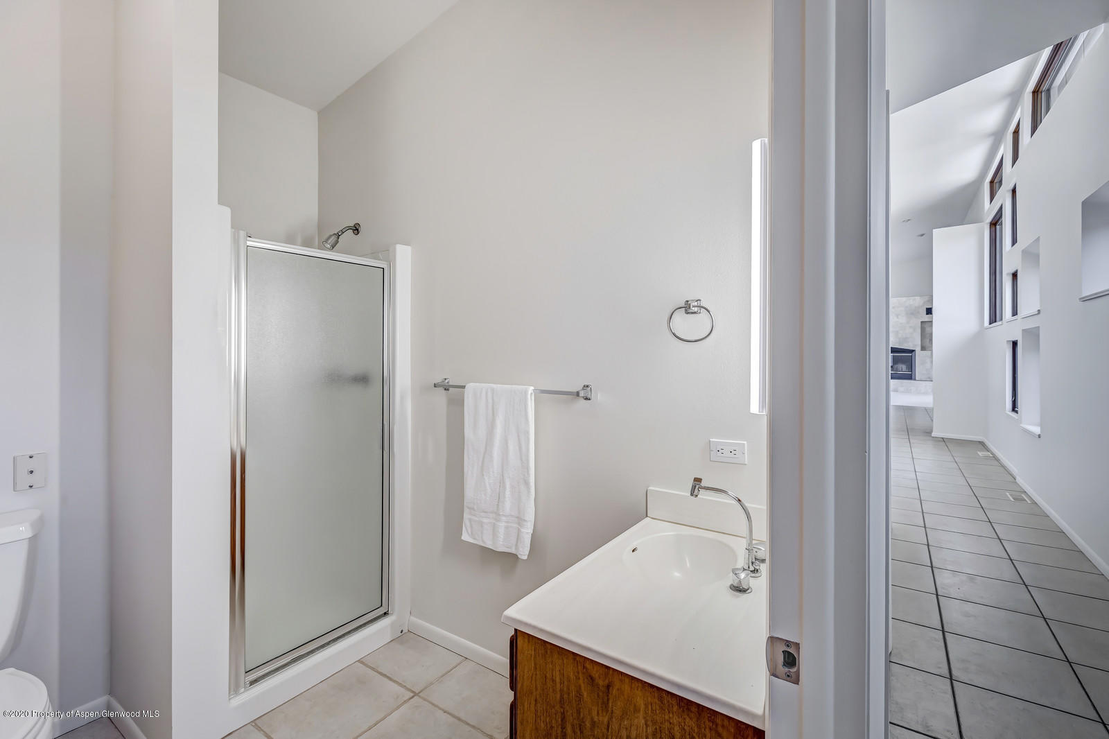735 Ute Avenue Rifle, CO 81650 - Photo 25 of 30 a bathroom with a sink and a mirror
