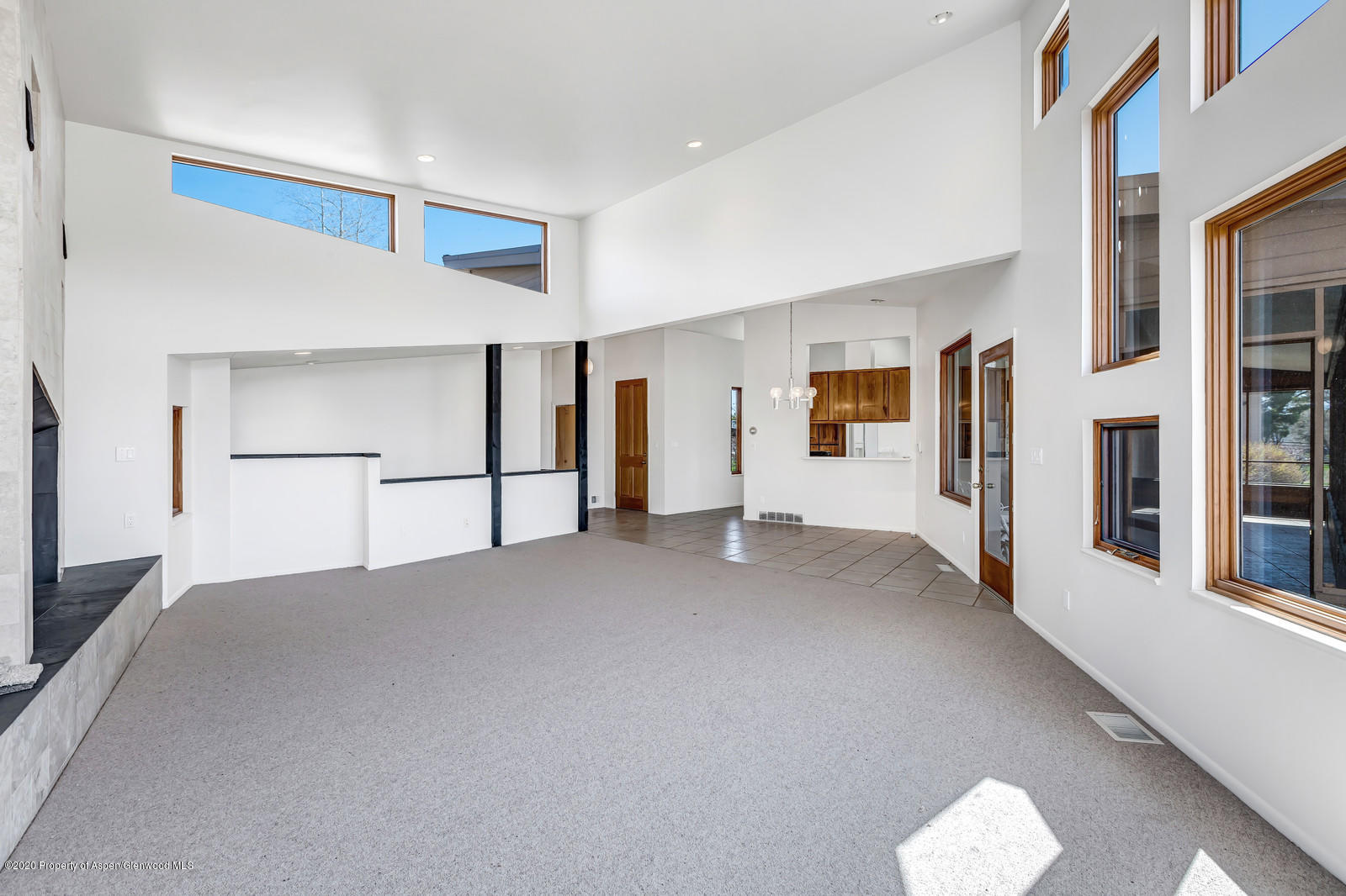 735 Ute Avenue Rifle, CO 81650 - Photo 4 of 30 a view of a big room with closet and windows