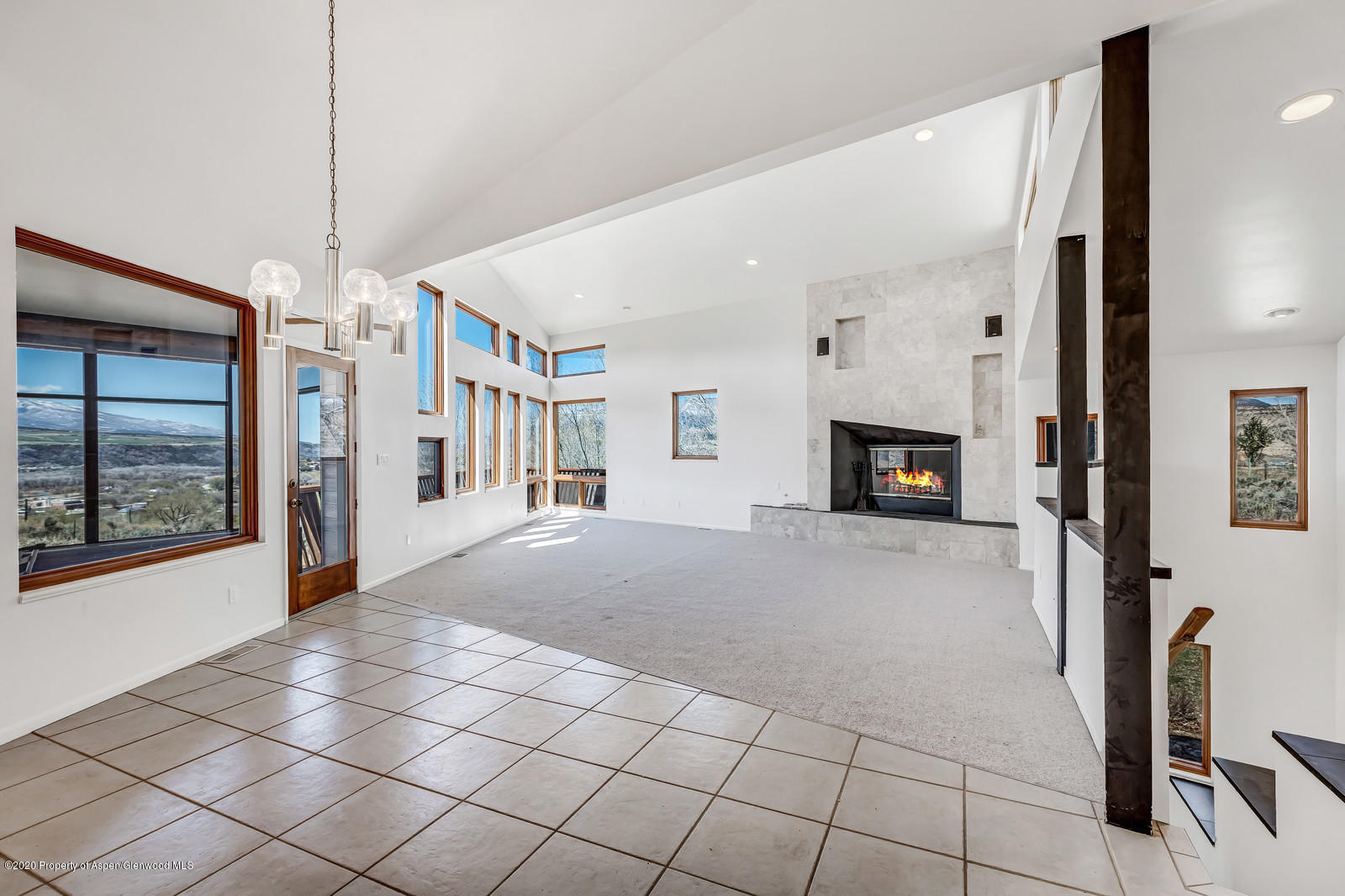 735 Ute Avenue Rifle, CO 81650 - Photo 6 of 30 a view of livingroom with furniture and floor to ceiling window