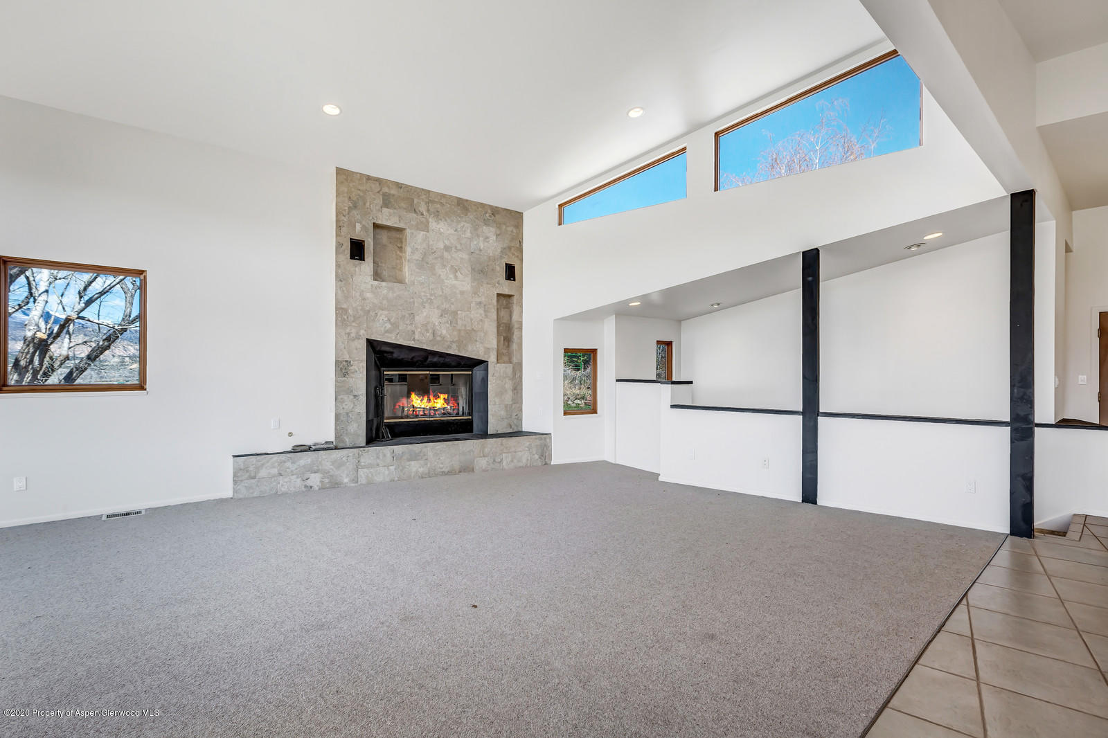 735 Ute Avenue Rifle, CO 81650 - Photo 9 of 30 a view of a livingroom with a fireplace