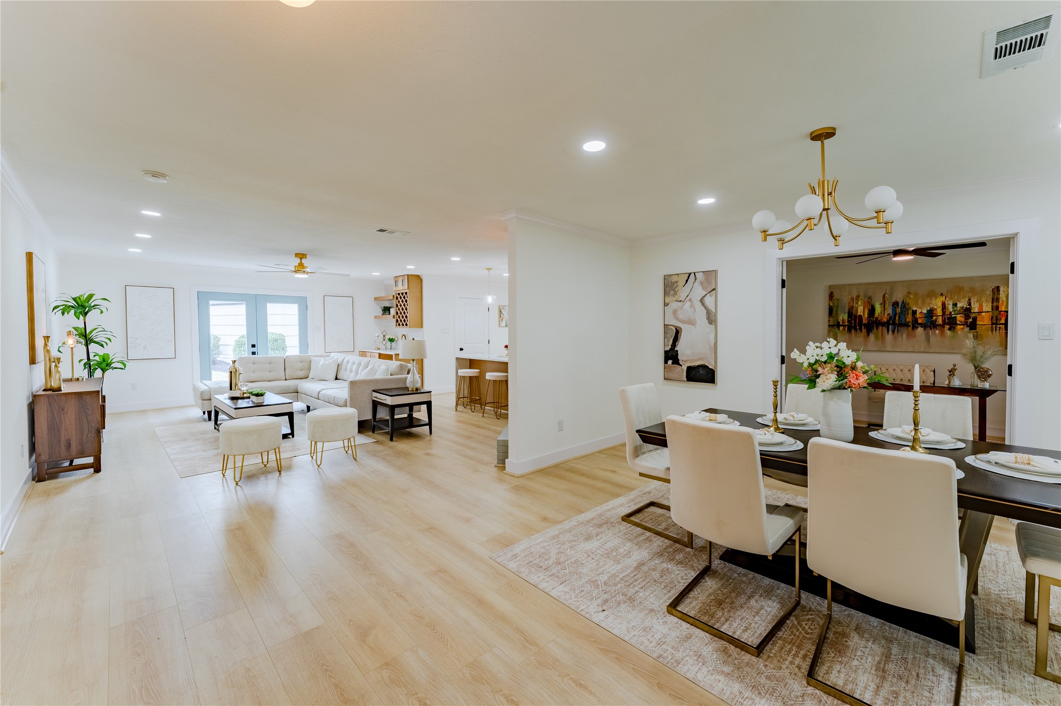 6027 Valkeith Drive Houston, TX 77096 - Photo 8 of 31 a view of a dining room with furniture window and wooden floor