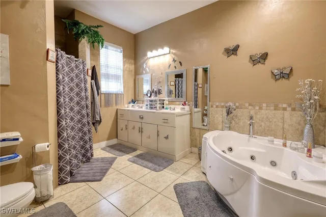 a bathroom with a bathtub sink and toilet