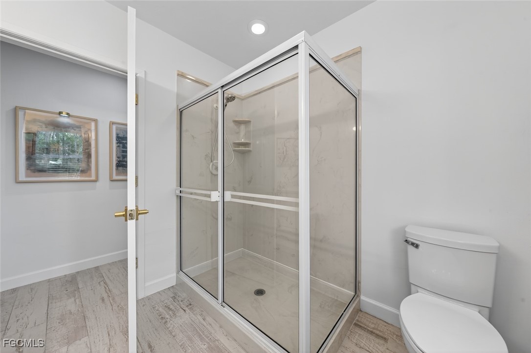 13570 Harbour Ridge Drive Fort Myers, FL 33908 - Photo 36 of 50 a bathroom that has a glass shower door
