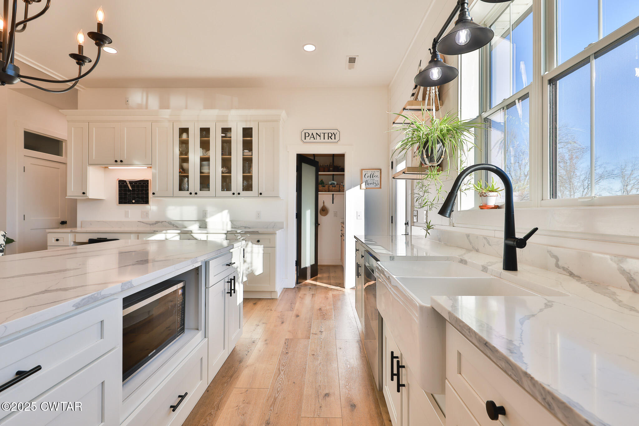 350 Klutts Road Dresden, TN 38225 - Photo 12 of 39 a kitchen with a sink stove and cabinets