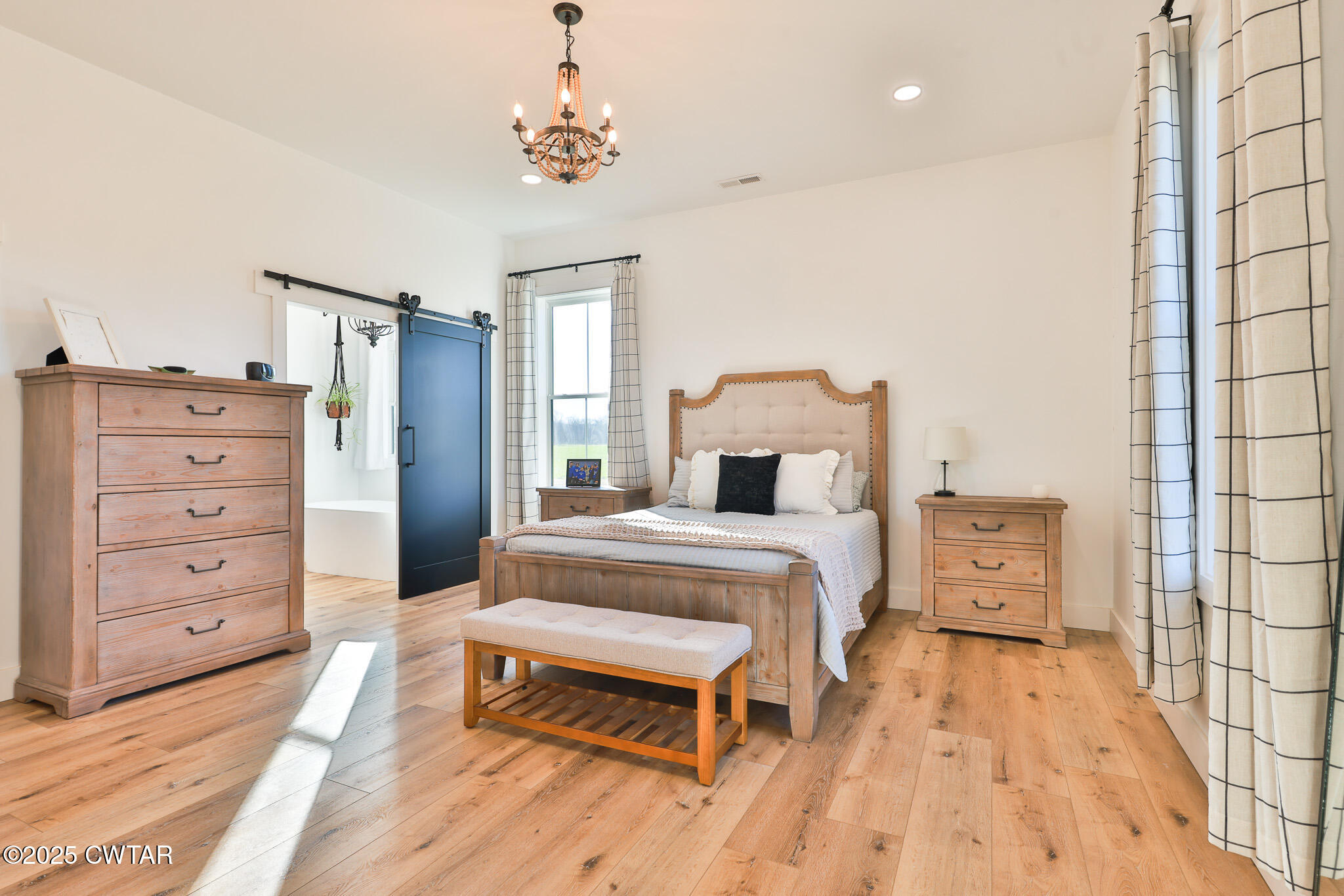 350 Klutts Road Dresden, TN 38225 - Photo 16 of 39 a bedroom with a bed and a dresser