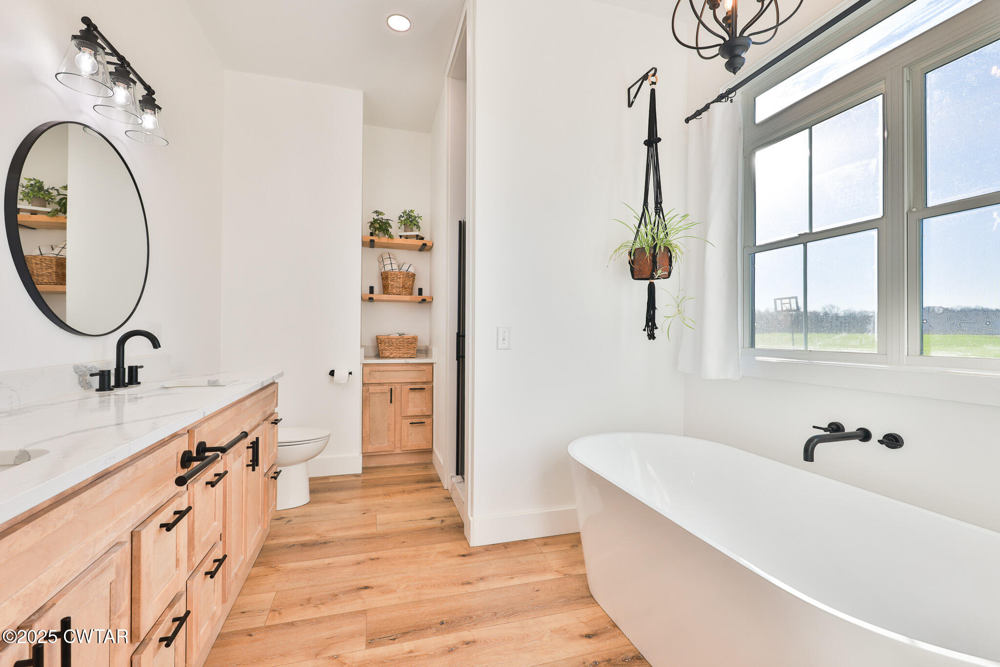350 Klutts Road Dresden, TN 38225 - Photo 18 of 39 a spacious bathroom with a tub sink and mirror