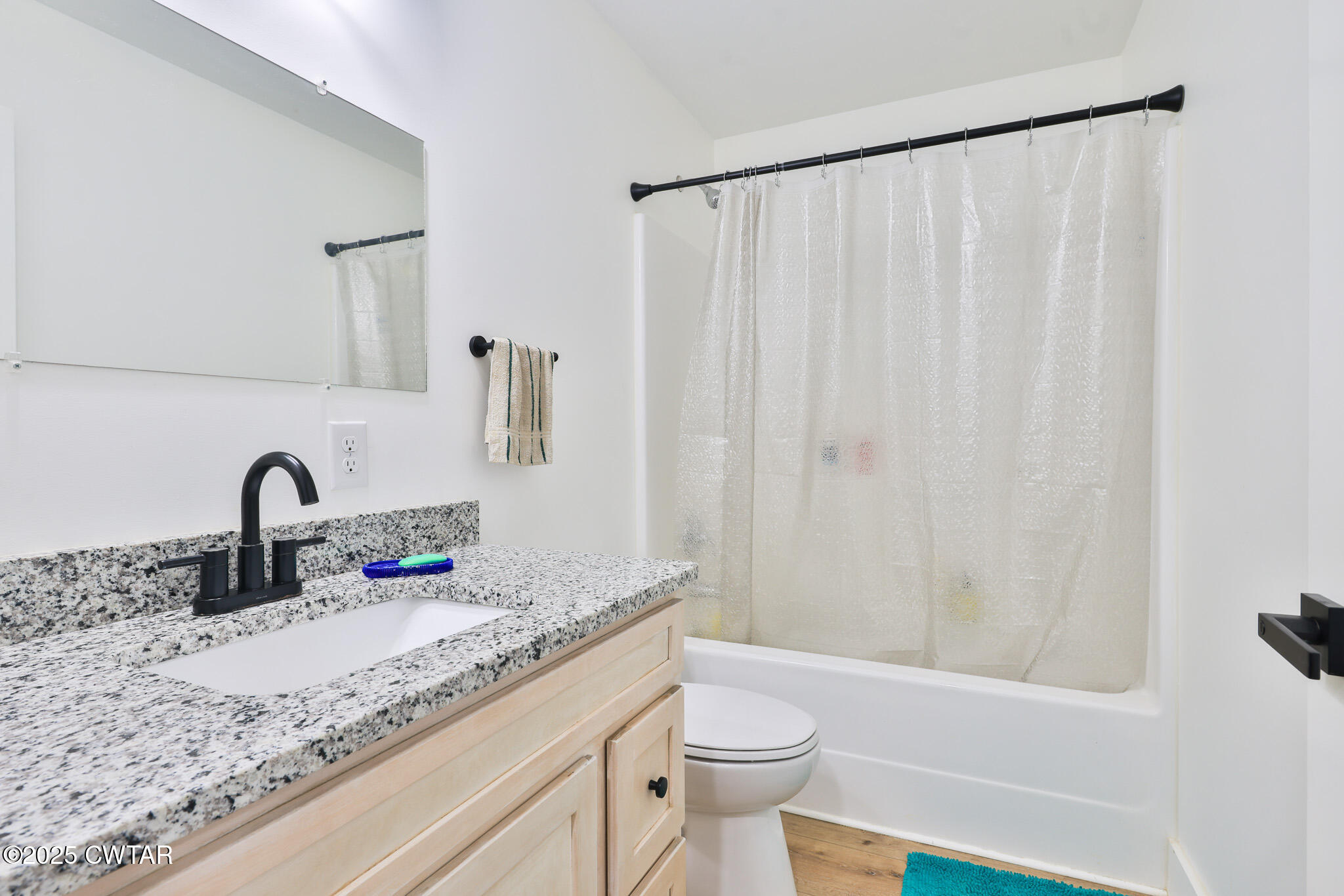 350 Klutts Road Dresden, TN 38225 - Photo 29 of 39 a bathroom with a granite countertop sink and a mirror
