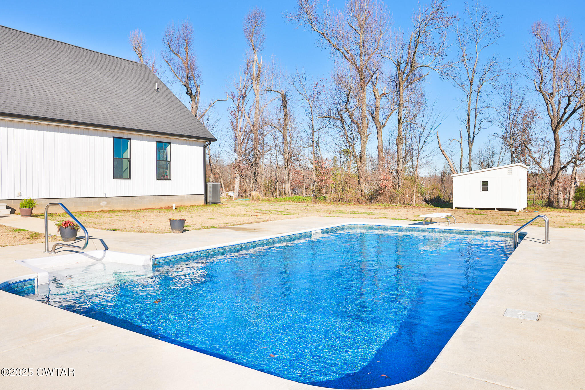 350 Klutts Road Dresden, TN 38225 - Photo 32 of 39 a view of swimming pool with outdoor seating
