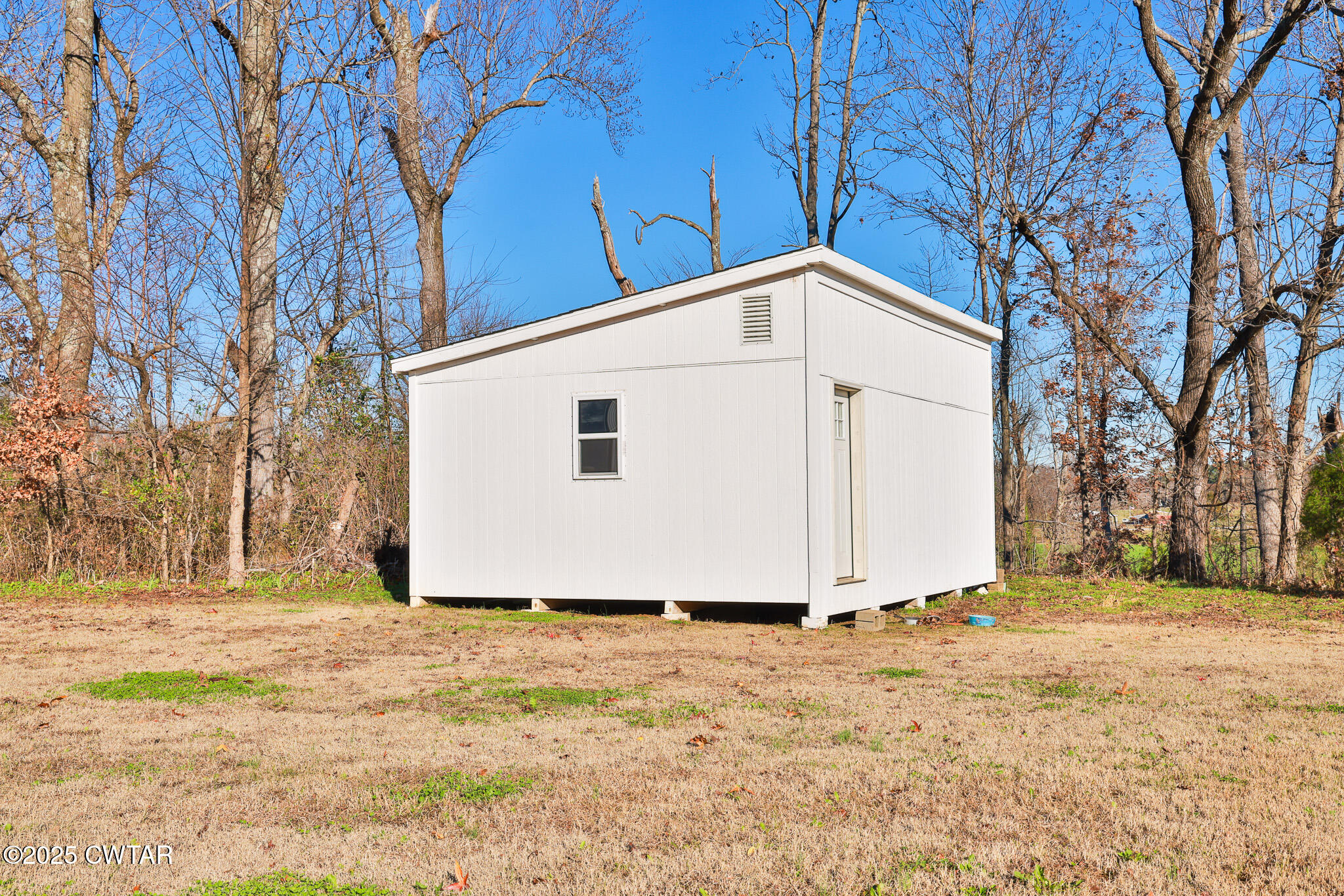 350 Klutts Road Dresden, TN 38225 - Photo 34 of 39 a view of a house with a yard