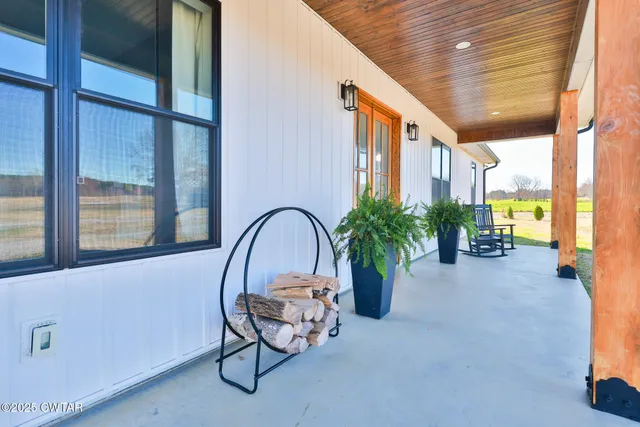 a view of a chairs and table in the room