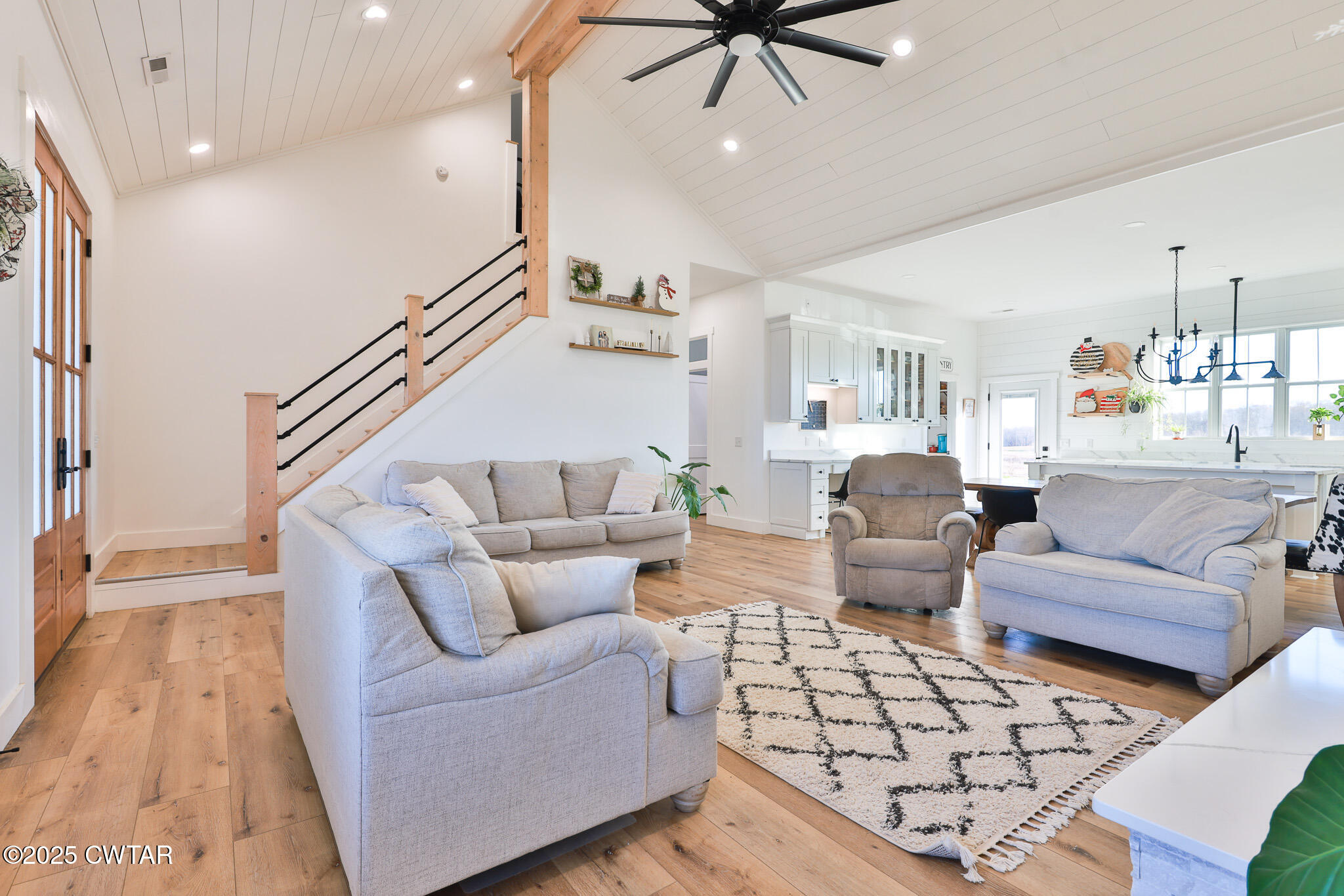 350 Klutts Road Dresden, TN 38225 - Photo 9 of 39 a living room with furniture and a chandelier