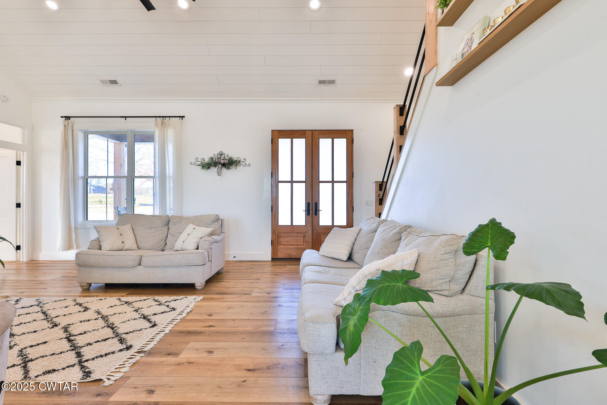 350 Klutts Road Dresden, TN 38225 - Photo 10 of 39 a living room with furniture and a large window