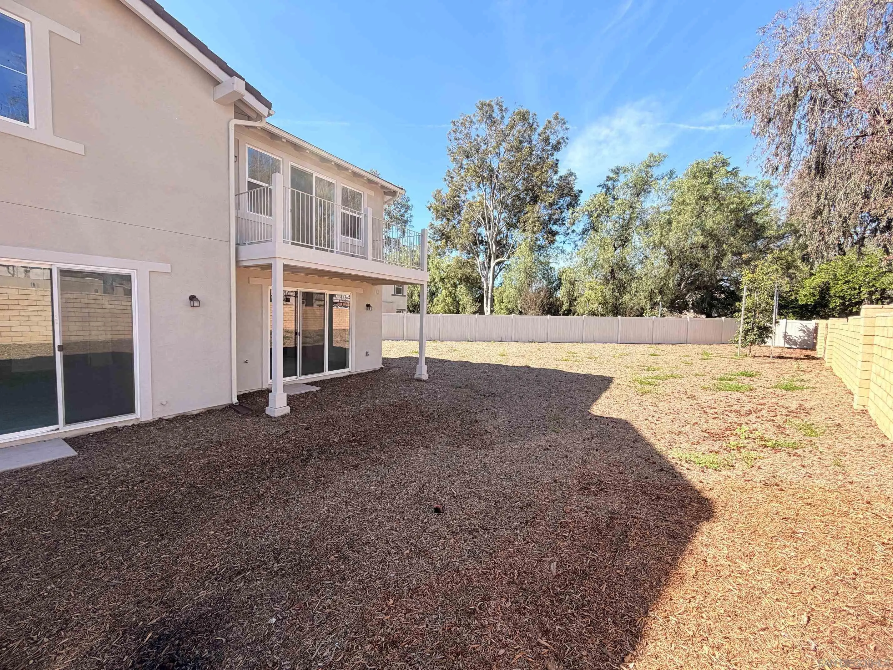 13780 Holly Oak Way Poway, CA 92064 - Photo 3 of 10 a view of a house with a yard