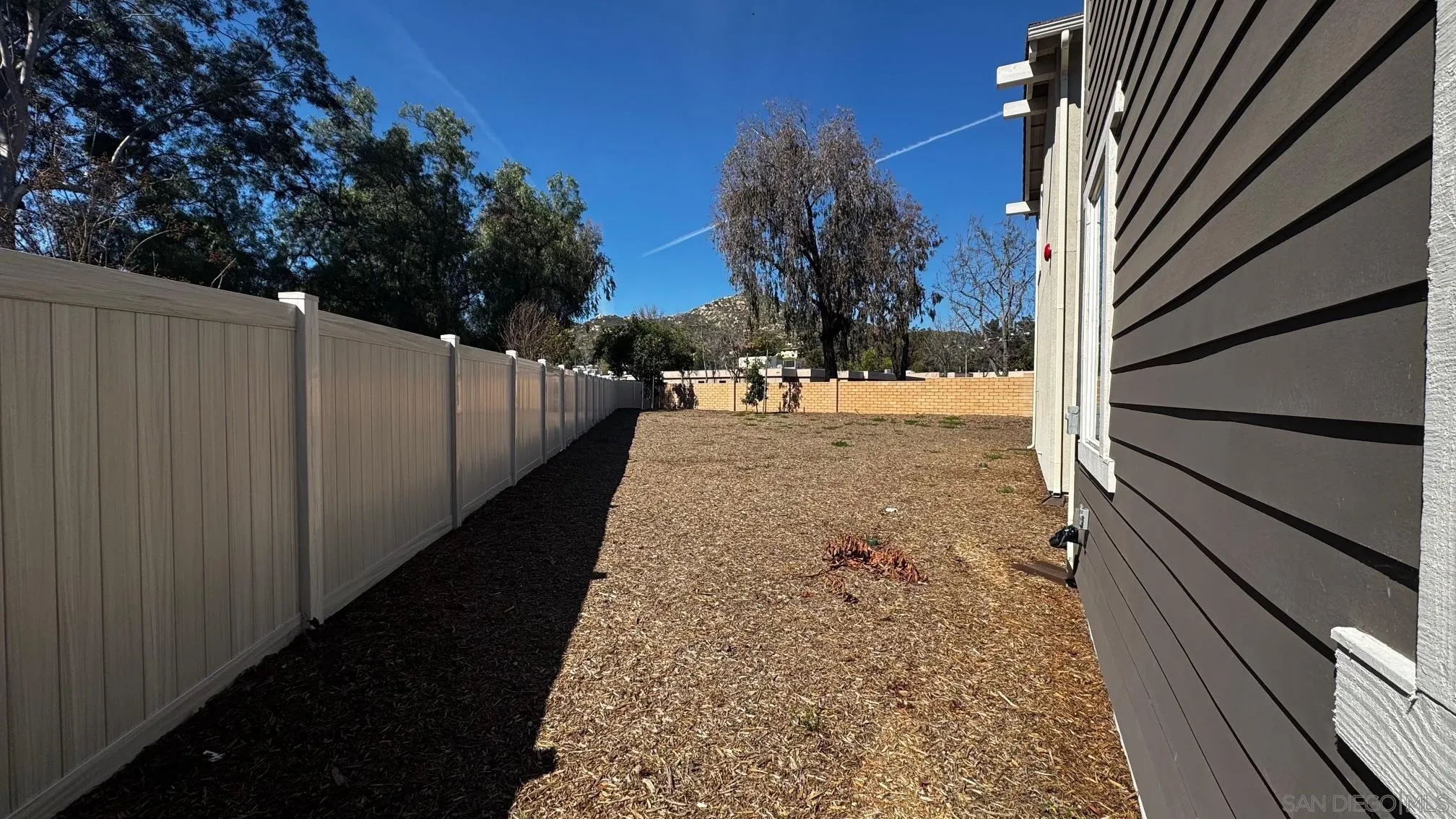 13780 Holly Oak Way Poway, CA 92064 - Photo 5 of 10 a view of a backyard of the house