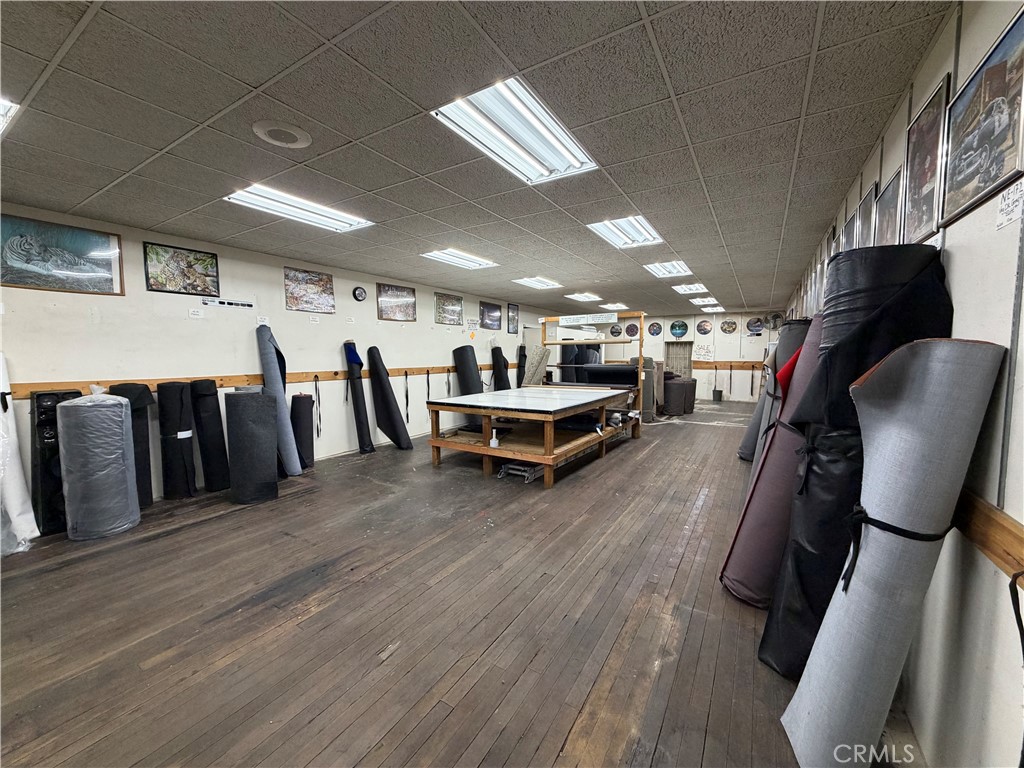 247 South Riverside Avenue Rialto, CA 92376 - Photo 17 of 34 a living room with furniture and wooden floor