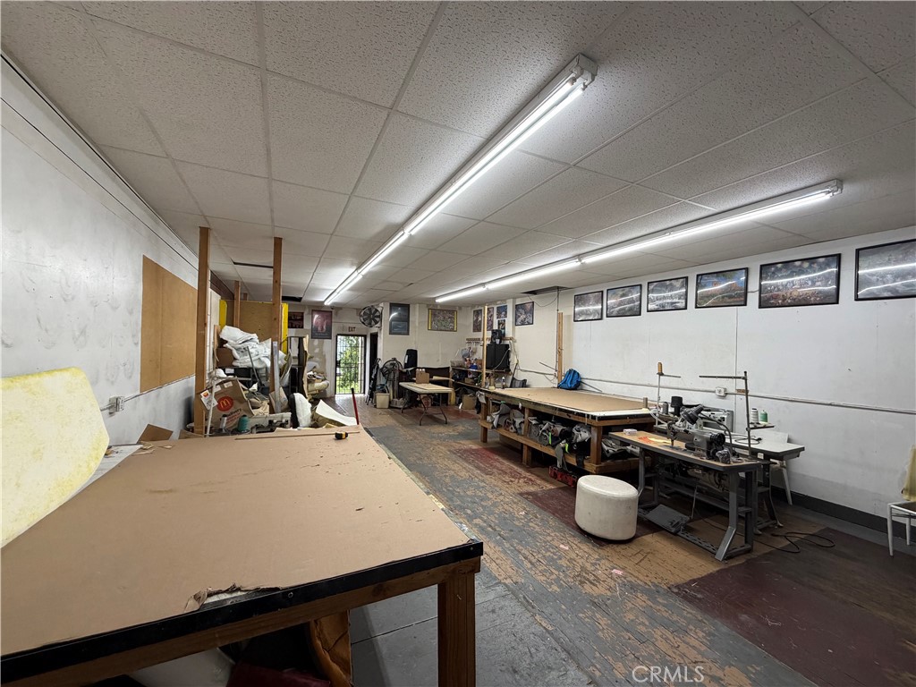 247 South Riverside Avenue Rialto, CA 92376 - Photo 32 of 34 a room with furniture pool table gym equipment and a window